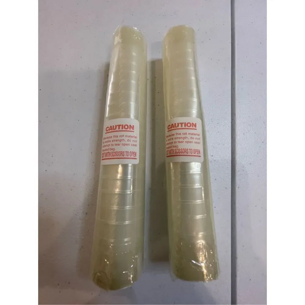 Rival Vacu-Roll model 50668 two 8 inch x 10 feet rolls. 2 miles thick